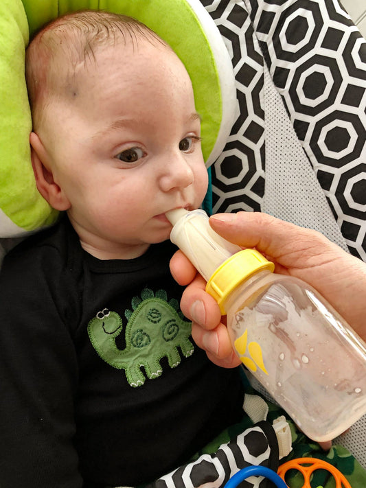 Jaxon trying the Medela Special Needs Bottle.
